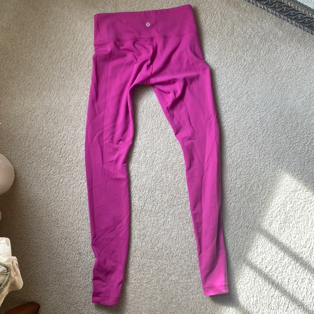 Lululemon reversible leggings.  Pink and black